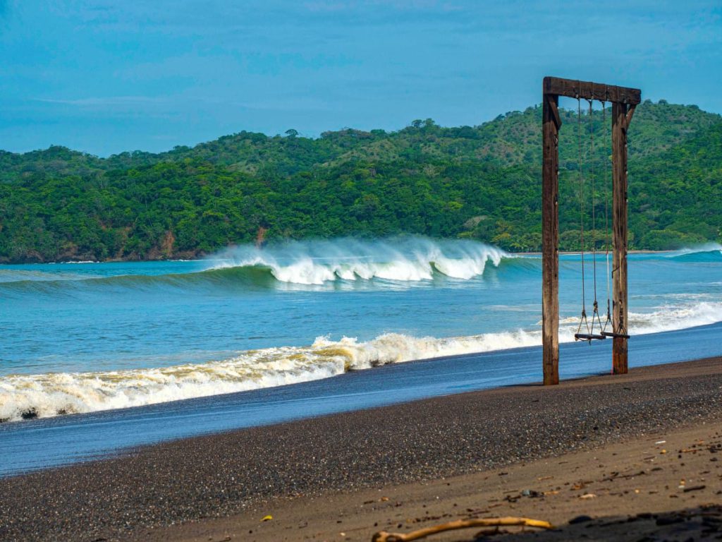 surf spot with perfect breaking waves and offshore wind at stunning playa venao